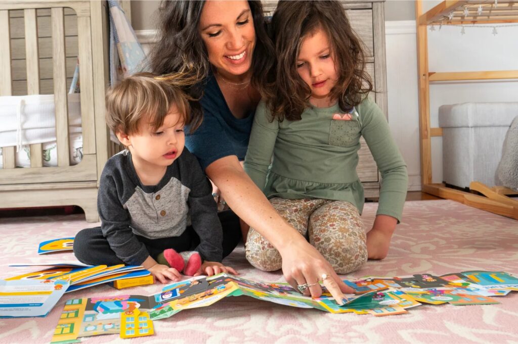 Mom playing a reading comprehension game with kids