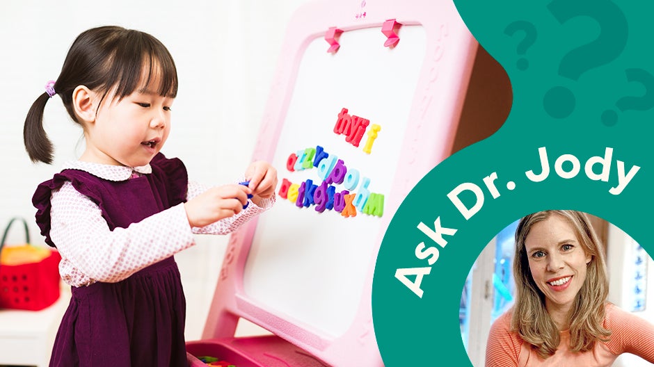 Blog header: 2-year-old playing with magnetic letters and head shot of Dr. Jody LeVos from Begin. Text reading Ask Dr. Jody.