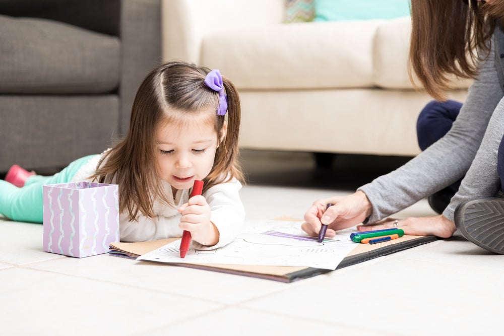 Mom coloring with daughter