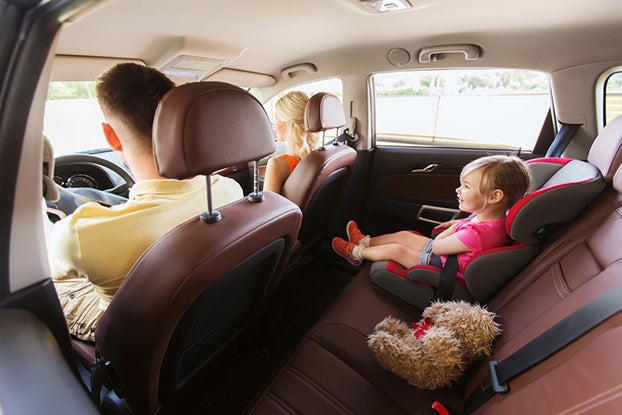 Family on a road trip playing educational games