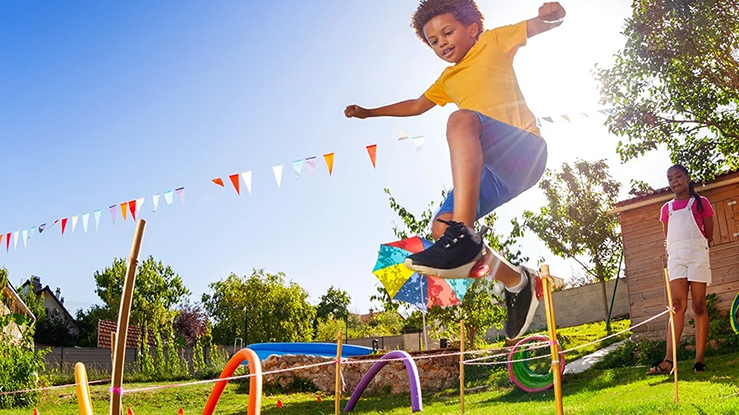 young kid doing physical play