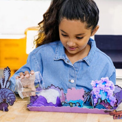 Young girl doing sensory play