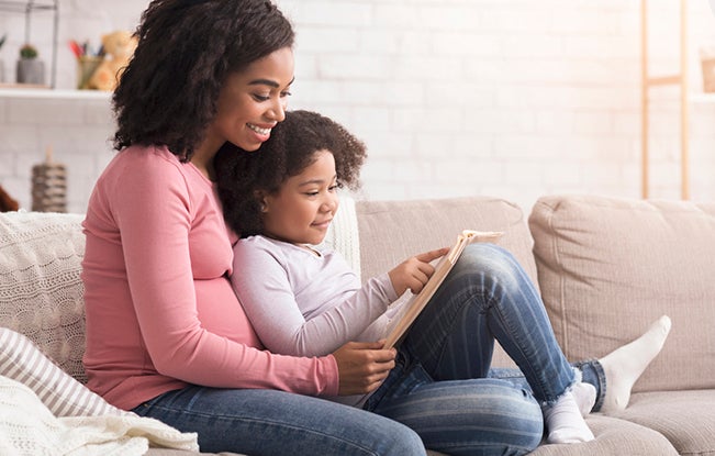 Mom doing 2nd grade reading with daughter