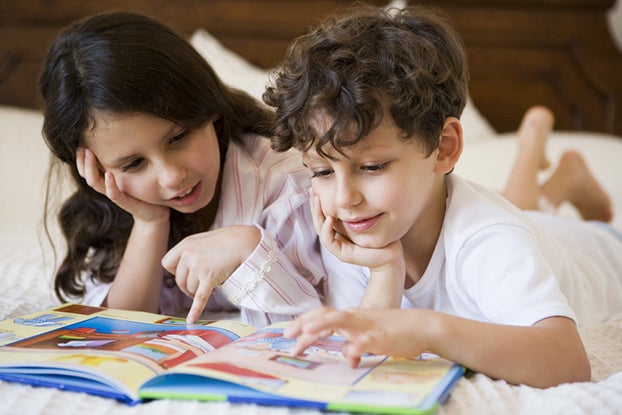 two kids reading